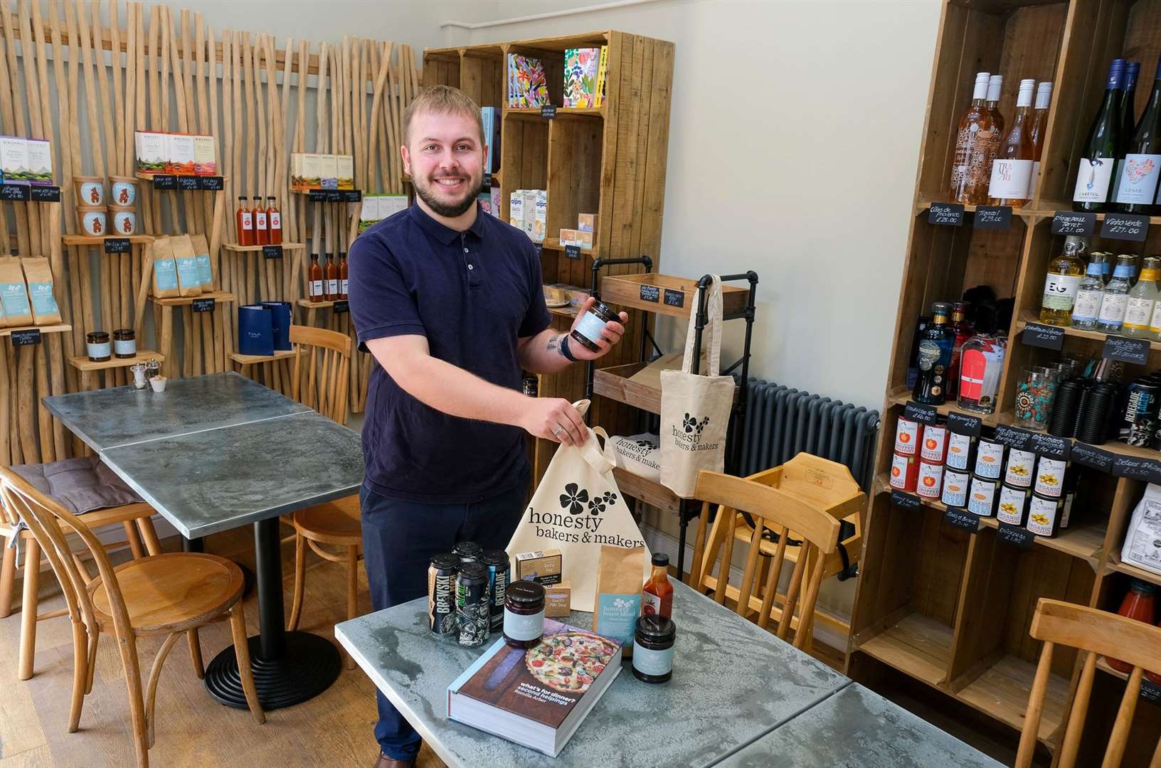Mr Chandler with a selection of shop products
