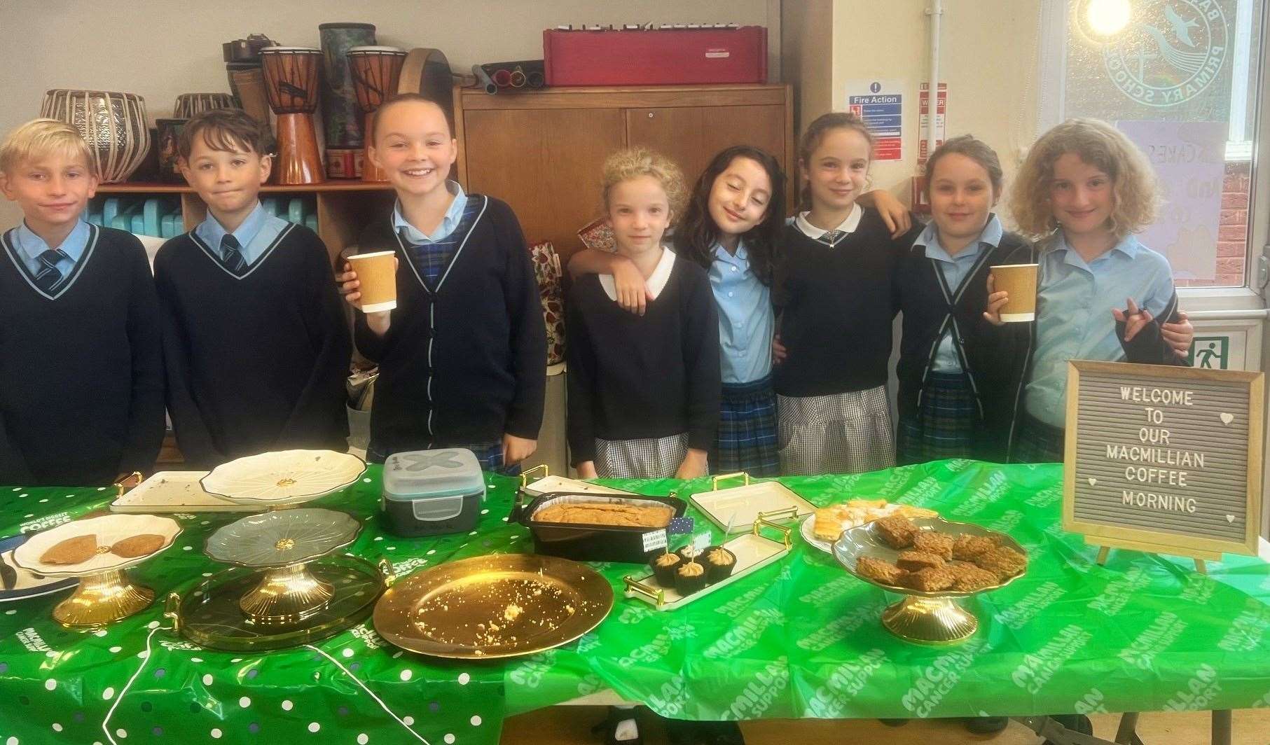Pupils from Basildon CE Primary School celebrate a successful bake sale for Macmillan Cancer Support