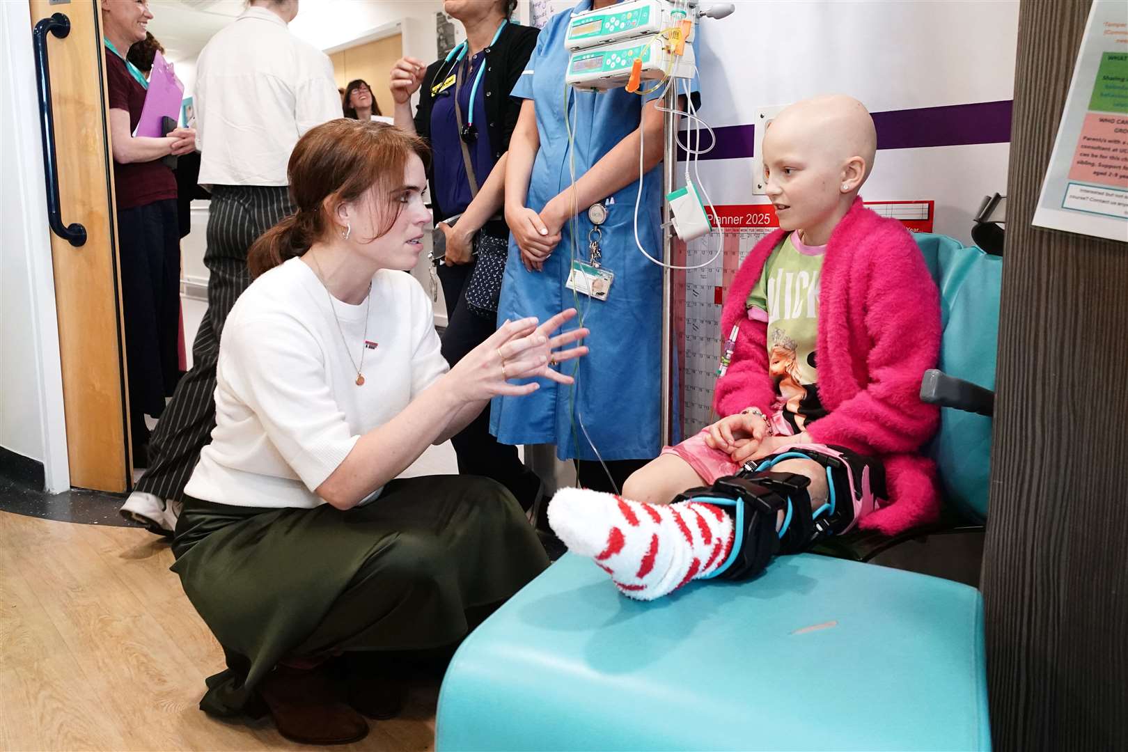 Princess Eugenie speaks to young cancer patient Lola Belle Tucker (Aaron Chown/PA)