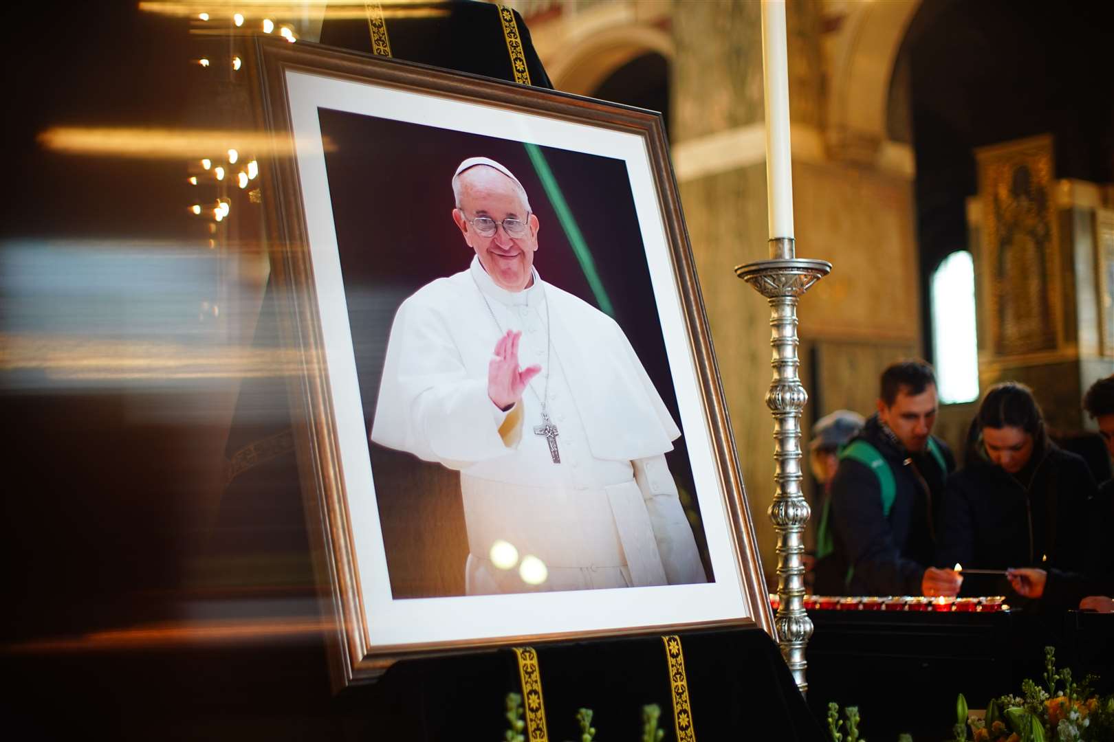 A picture of Pope Francis on display in Westminster Cathedral in Victoria, London, following the announcement by the Vatican of his death aged 88 (James Manning/PA)