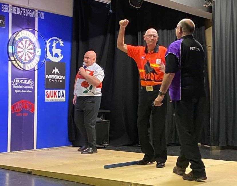 Bob Anderson and Peter Bush playing darts