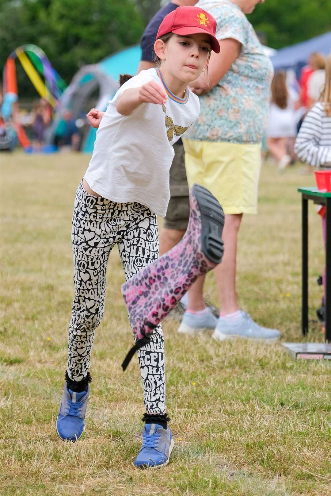 Abigail Griffiths-Eyton, age eight, trying her hand at welly wanging