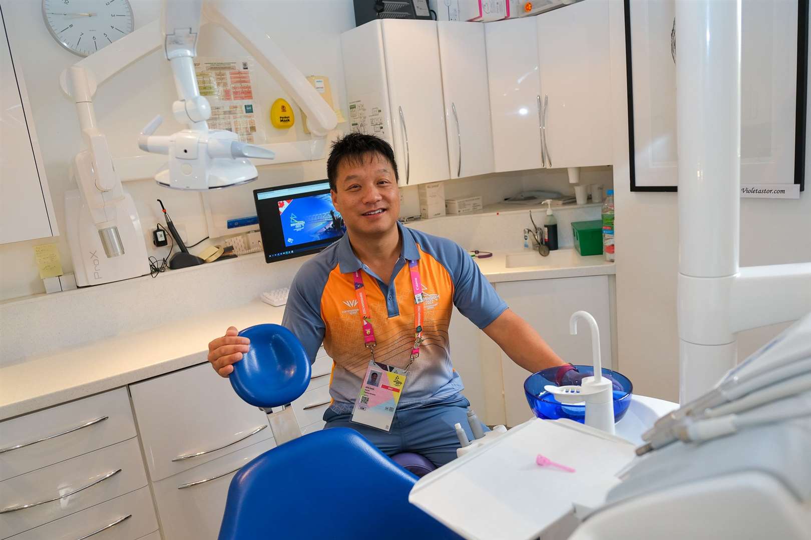 Alfie Chan is working as a voluntary dentist at the Commonwealth Games