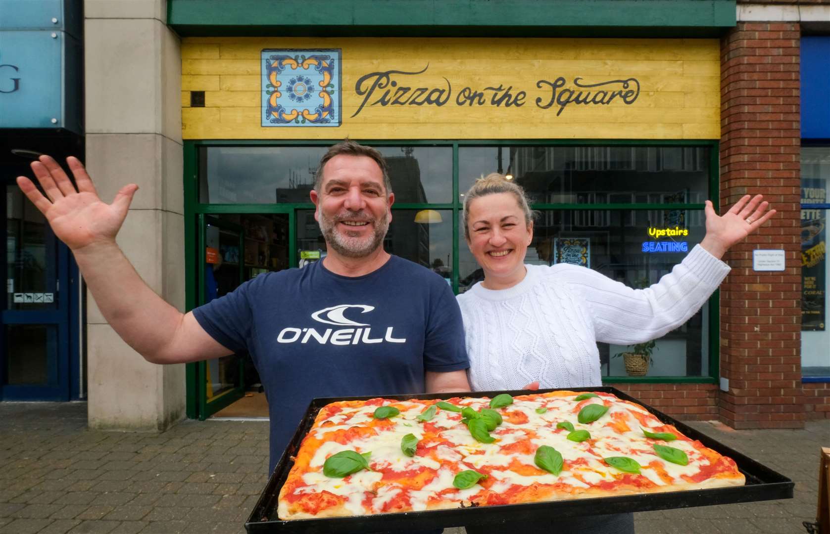 Antonio and Susy Margiotta outside their new Market Place eatery, Pizza on the Square