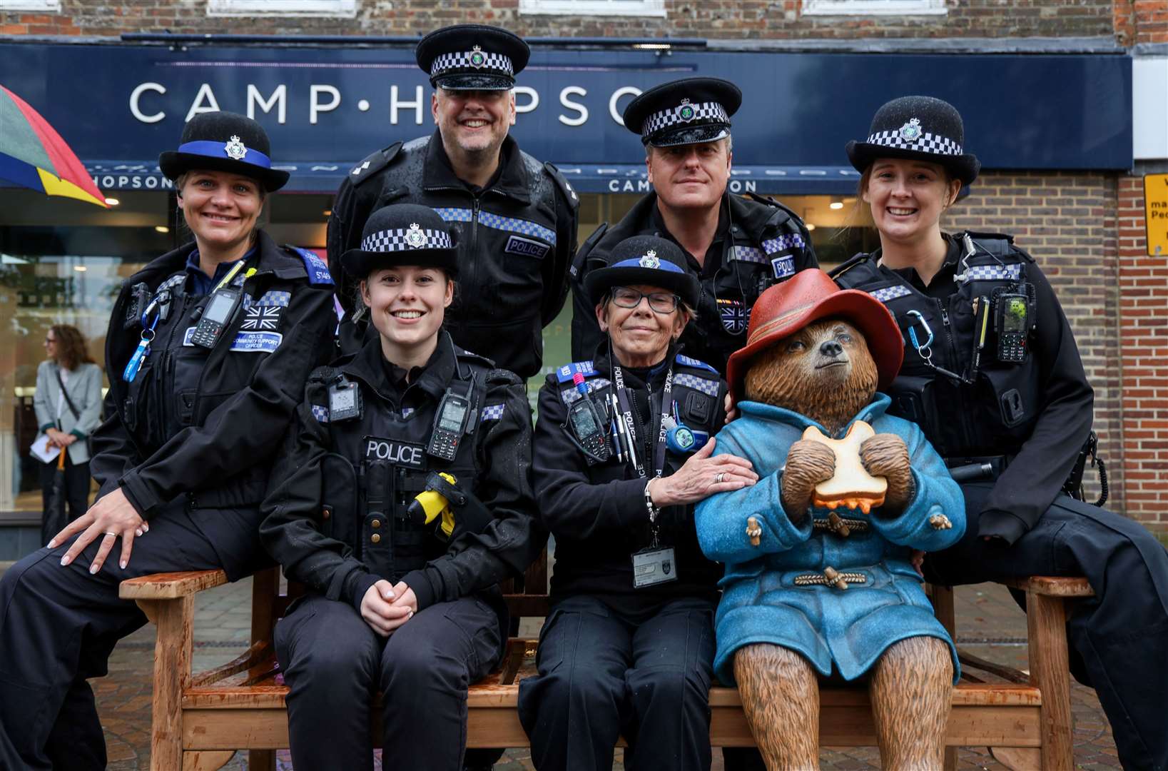 Sue sitting next to Paddington Bear before he was vandalised in Northbrook Street