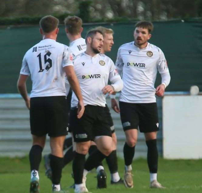 Hungerford Town's Kyle Tooze (centre) celebrates with Dawid Regula (right)