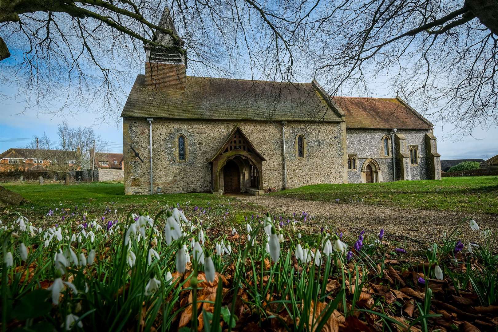 St Nicholas Church with snowdrops in bloom