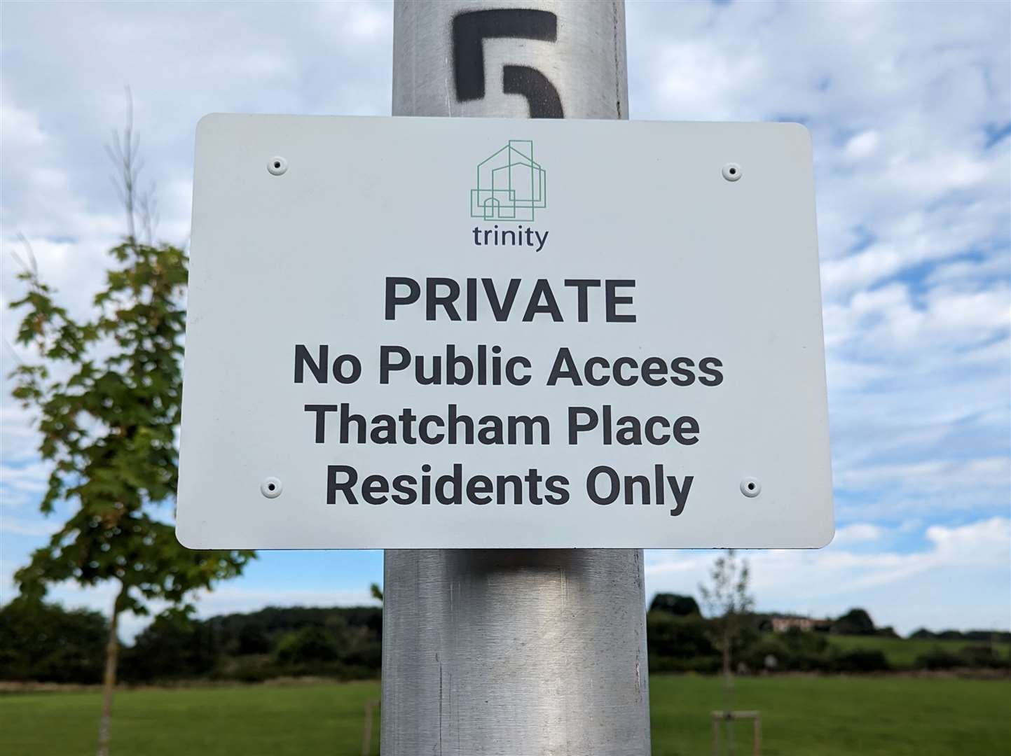 One of the signs that were erected on the green space