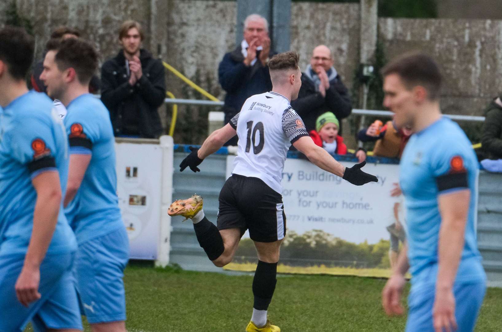 Jake Evans celebrates his free-kick