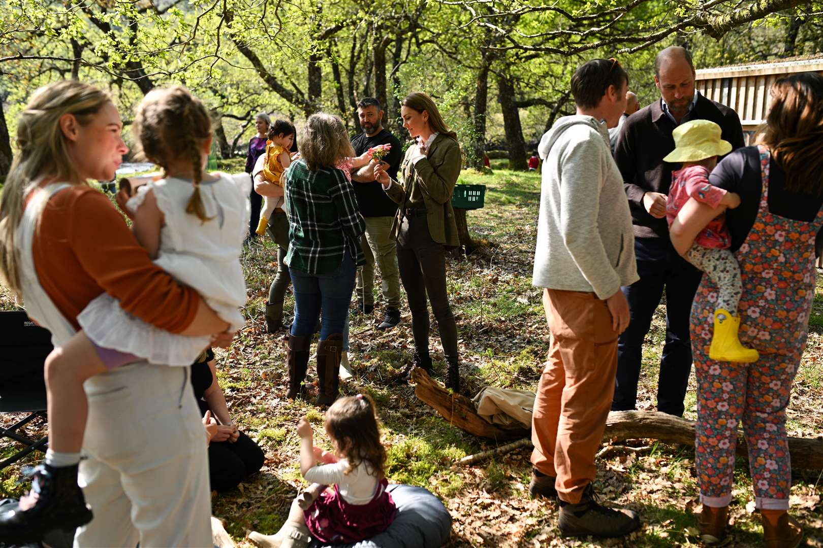 William and Kate chatted to families using the woodland (Oli Scarff/PA)