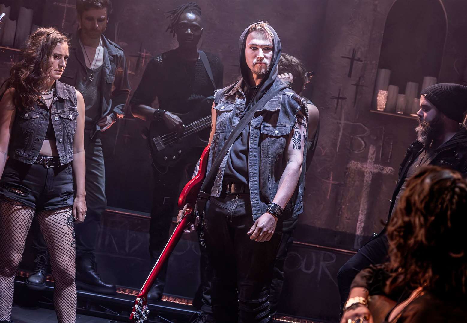 Max Alexander-Taylor as Judas and ensemble. C) Pamela Raith Photography