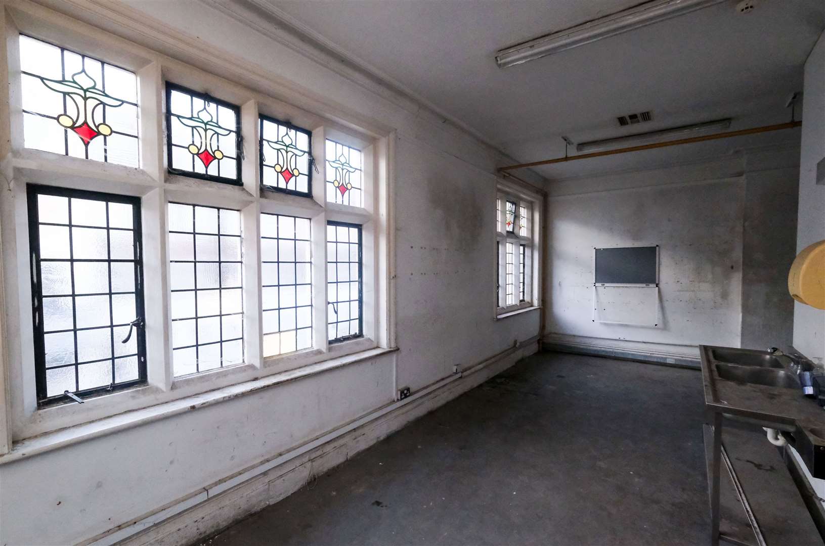 Old Library in Cheap Street, the old stained glass windows in what will be the upstairs engagement space Ref: 08-1024K