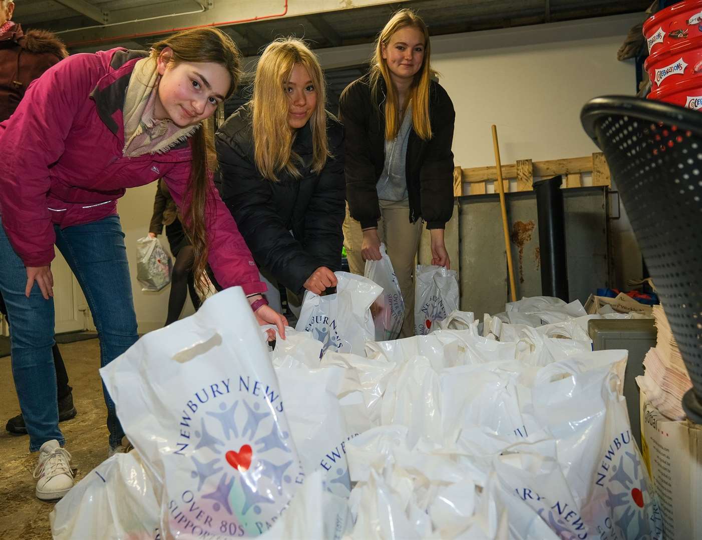 NWN Over 80s Parcels - Year 12 St Barts Students unloading van at NWN. (61245938)