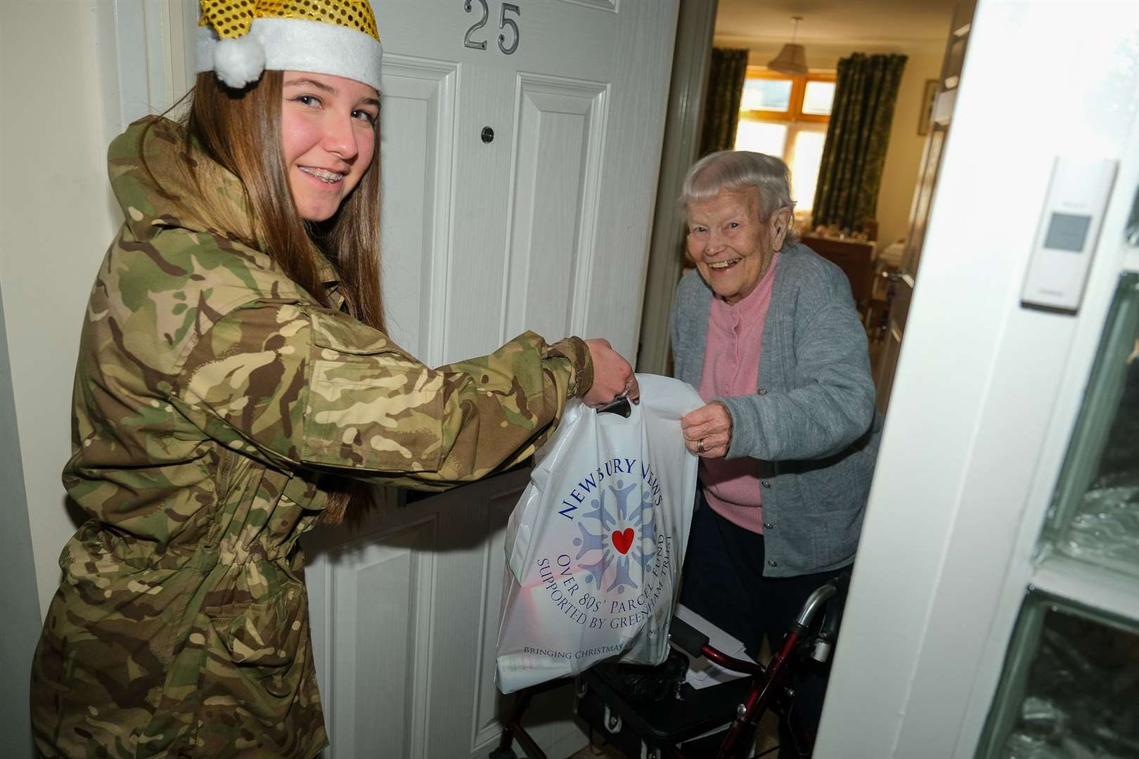 St Bart's pupils delivering parcels at Willow Close, to Munday Larry
