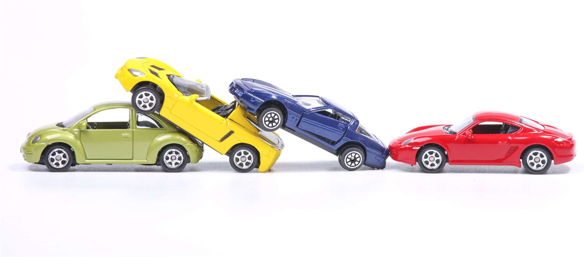 Toy cars in a simulated chain crash - National Highways says drivers must follow the two second rule