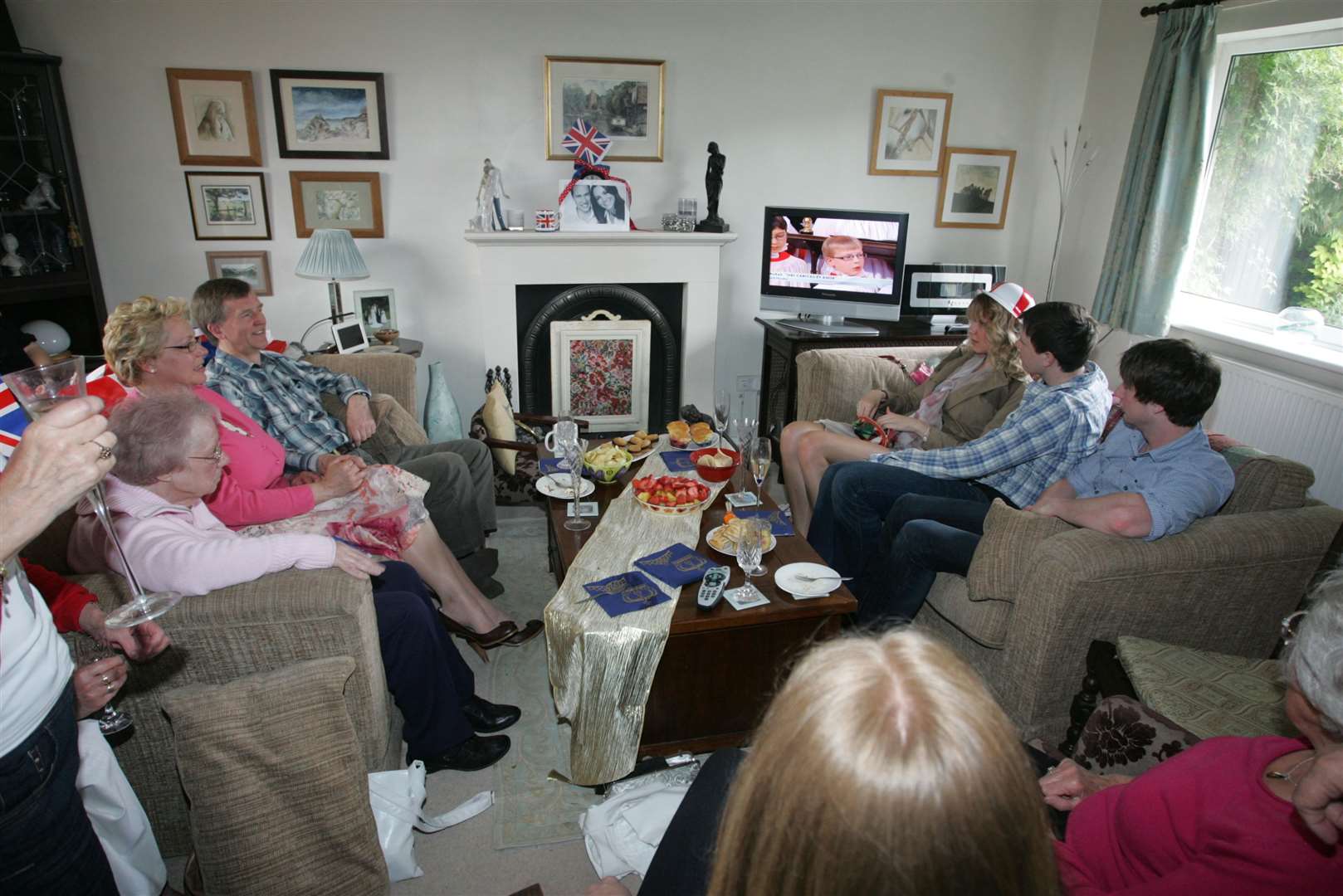 A family in Bucklebury watch the Royal Wedding on TV