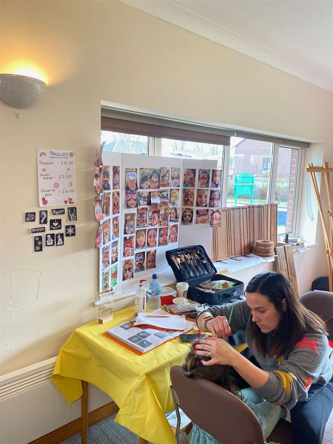 The face painter hard at work