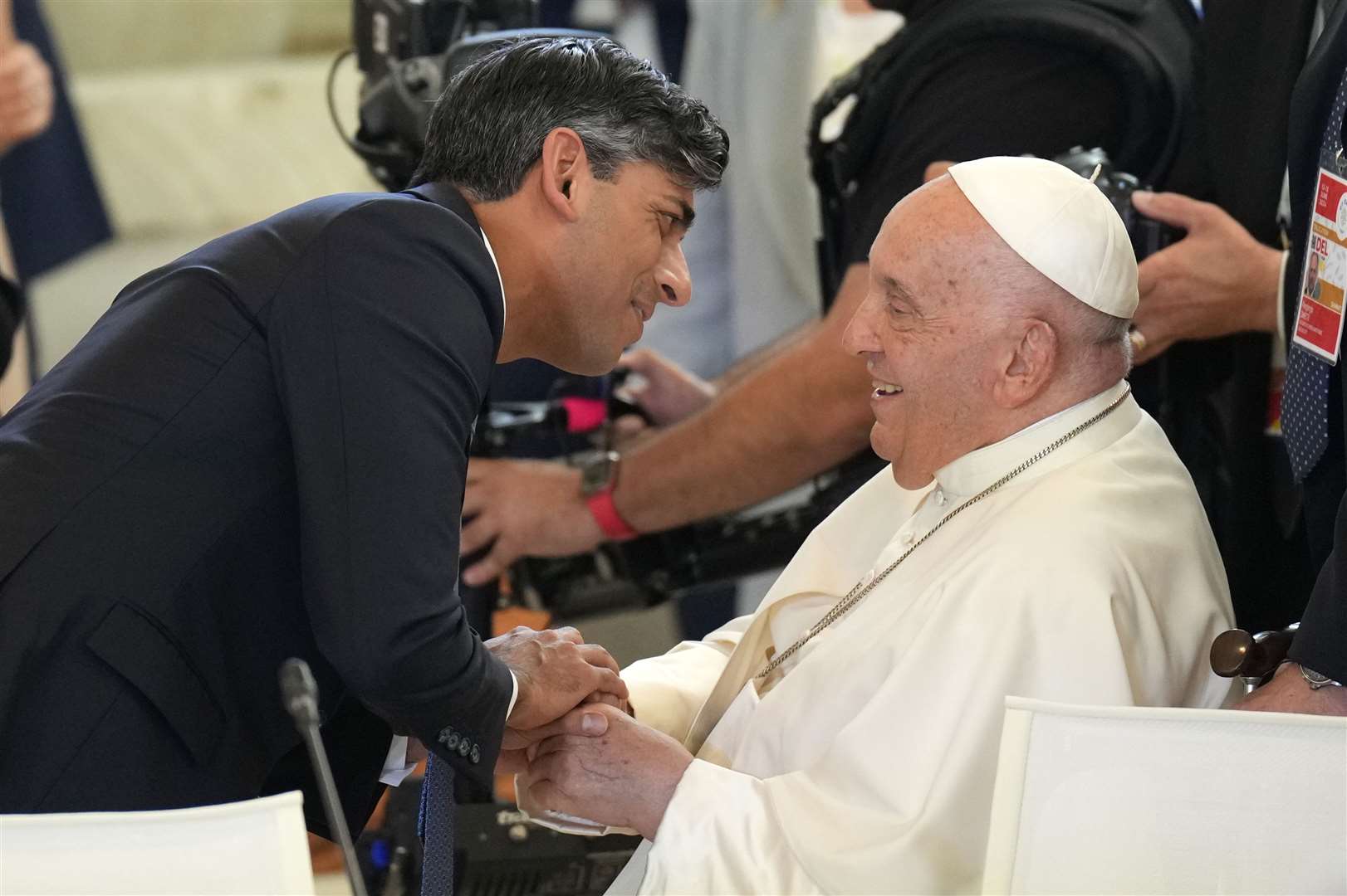 Then prime minister Rishi Sunak greets Pope Francis at the 2024 G7 summit (Christopher Furlong/PA)