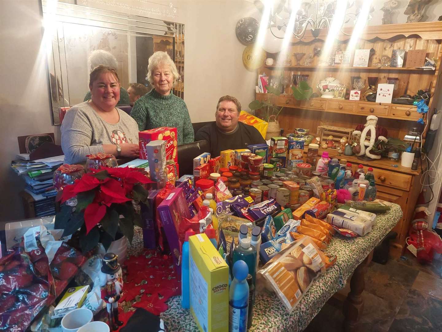 Mark Palmer-Broughton,Shelia from West Berkshire food bank and Louise Palmer-Broughton. Picture: Mark Palmer-Broughton