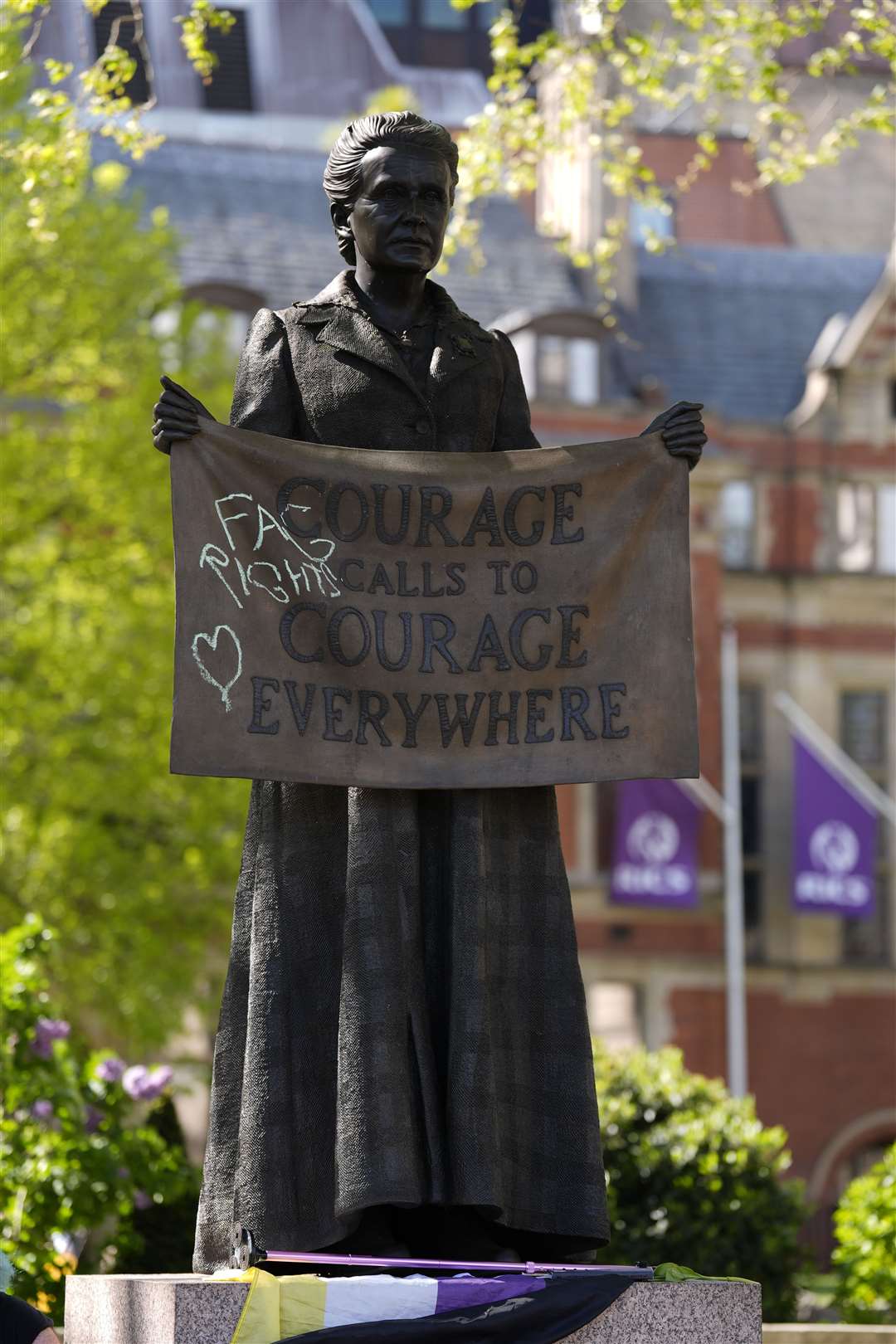 Graffiti on a statue of women’s rights campaigner Millicent Fawcett (Andrew Matthews/PA)