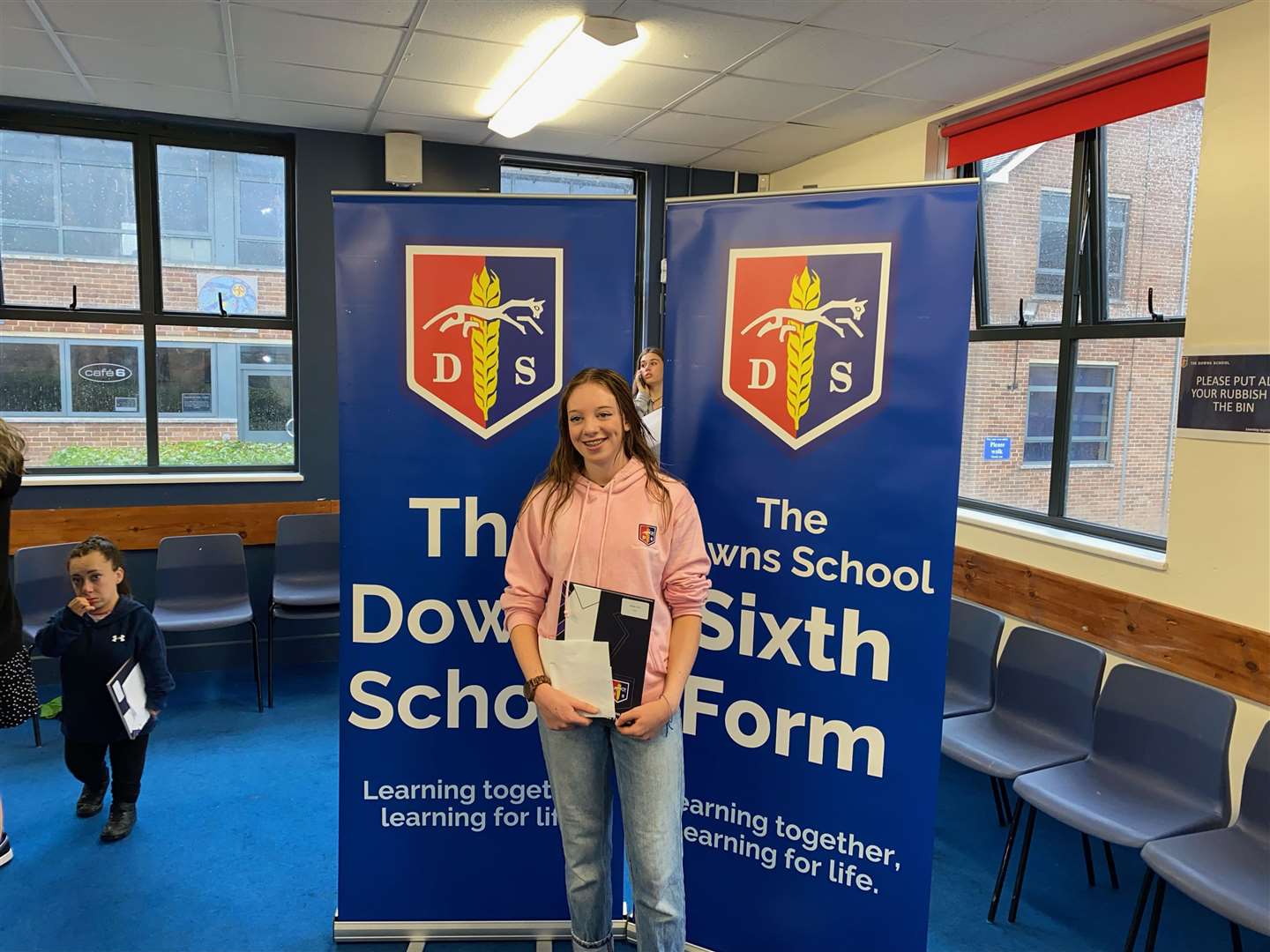 Students at The Downs School celebrating their GCSE results (58882128)