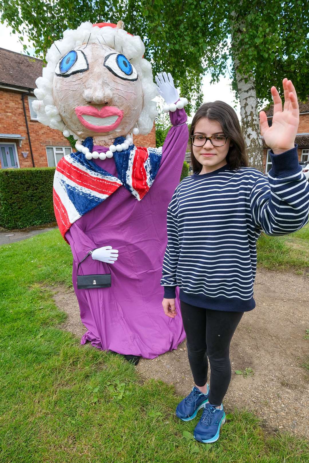Sophie Cottrill, 12, with her scarecrow
