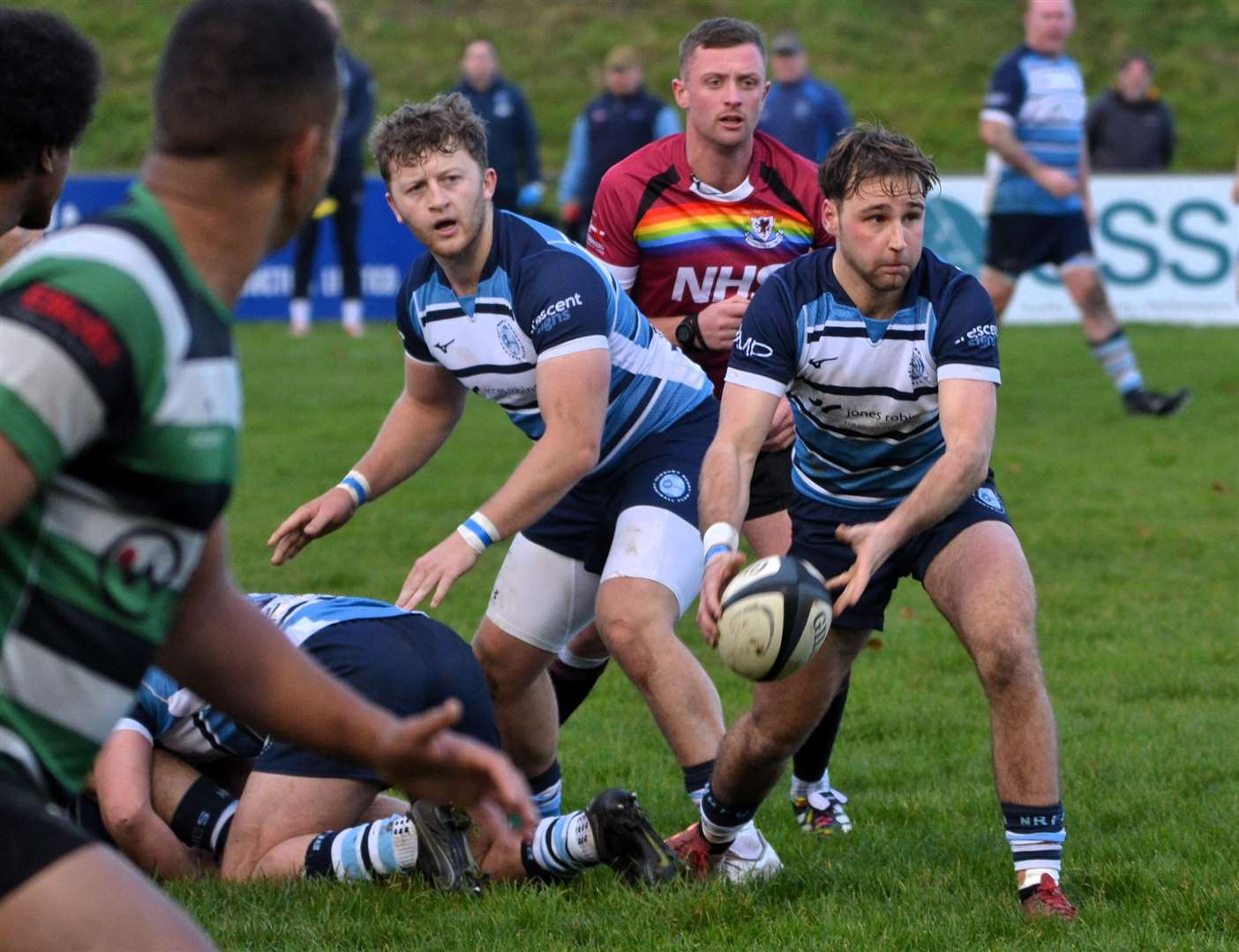 Scrum half Euan Lindsay recycles possession