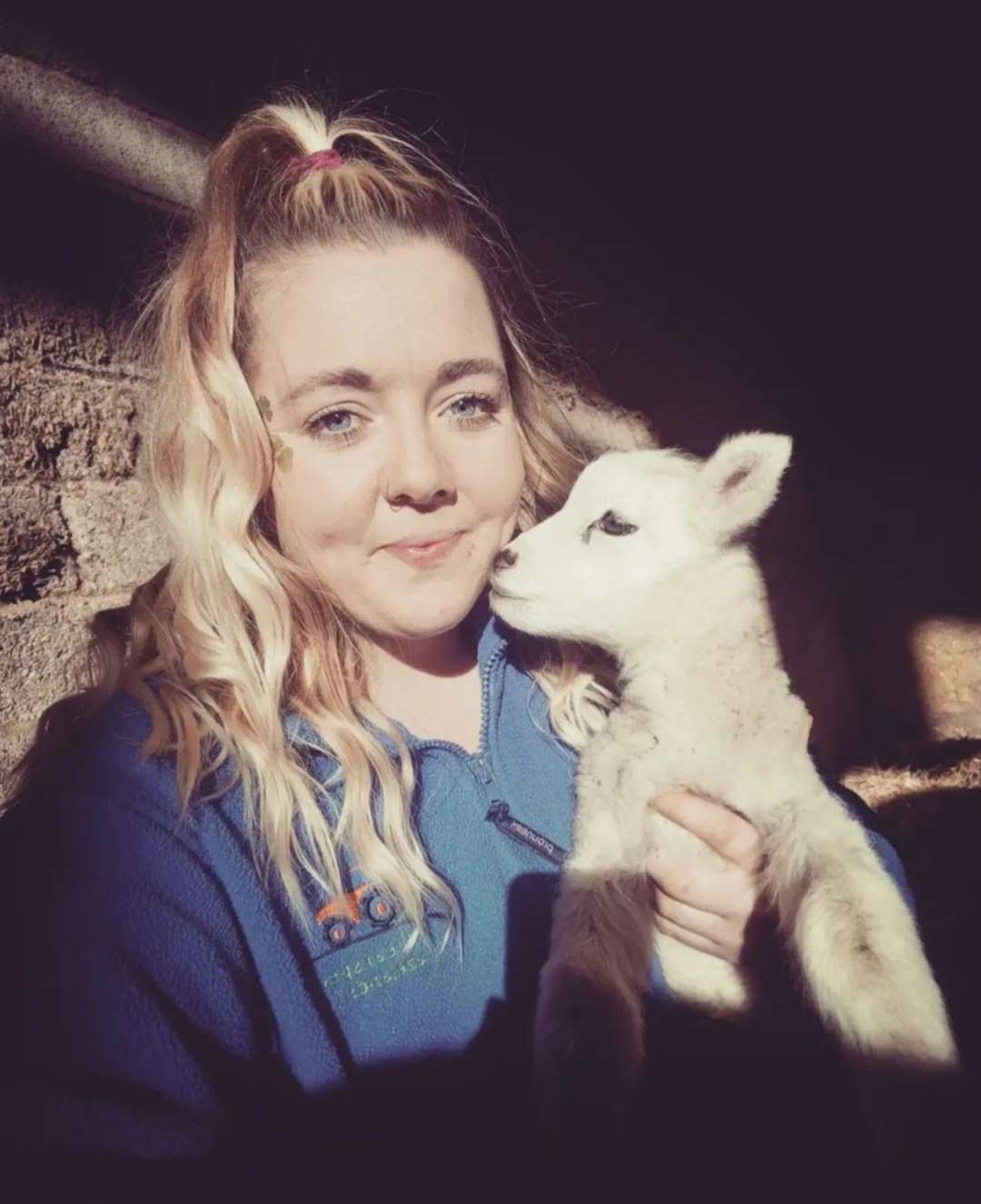 Becky Breakspear with some of the new lambs
