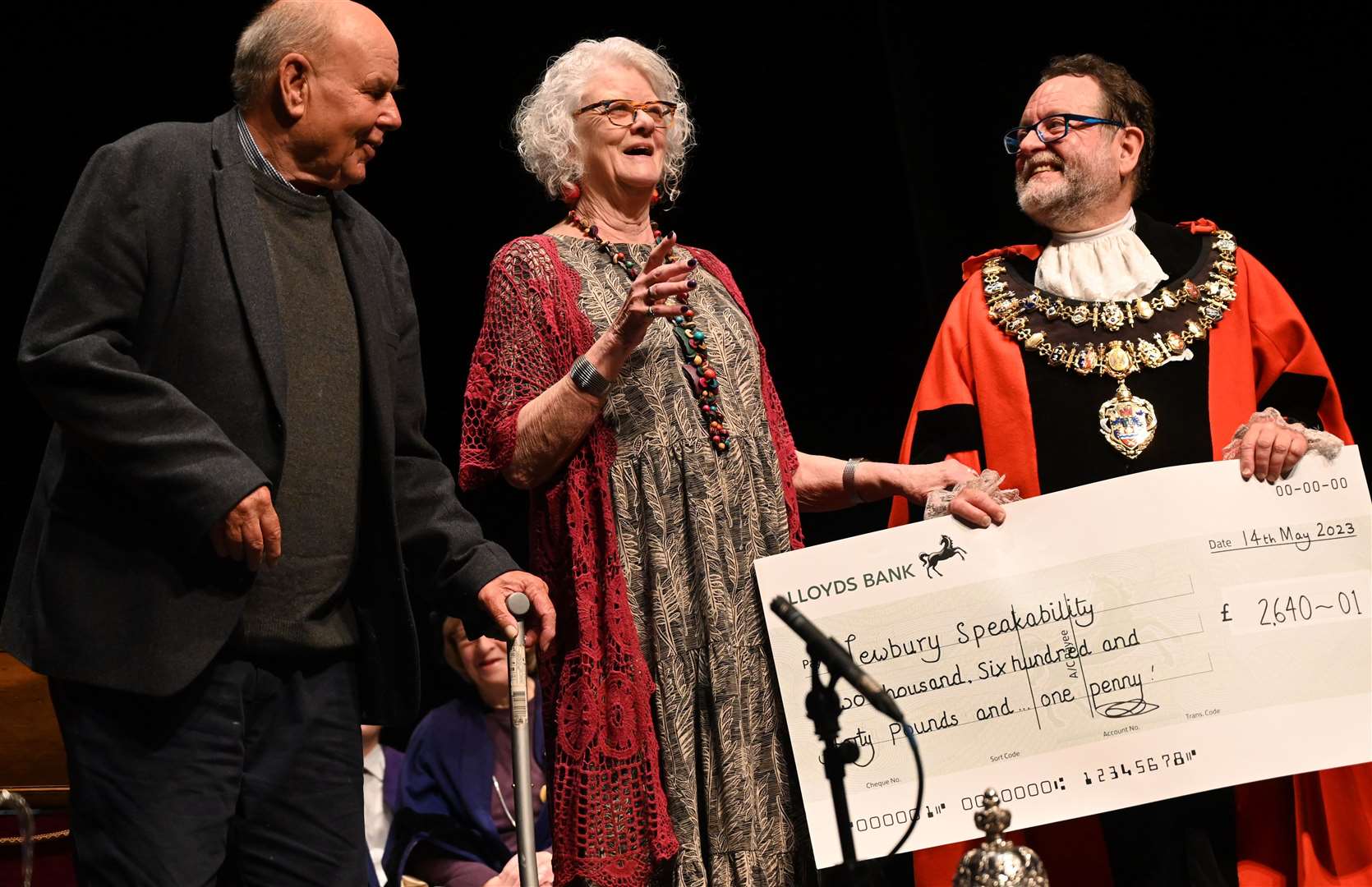Outgoing mayor Gary Norman presenting a cheque of £2,640.01 to Aphasia charity Newbury Speakability, one of his chosen charities