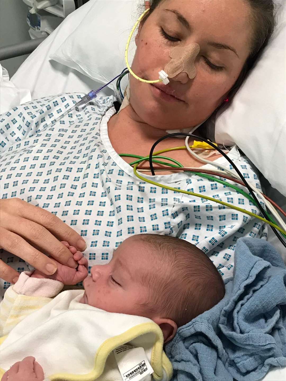 Shelly Young, 33, in hospital with newborn Maxwell Young. Picture by: Irwin Mitchell. (52936891)