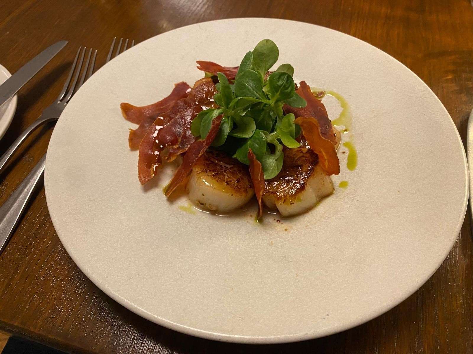 Grilled scallops with cauliflower cream, pancetta and a black pudding crumb (£15)