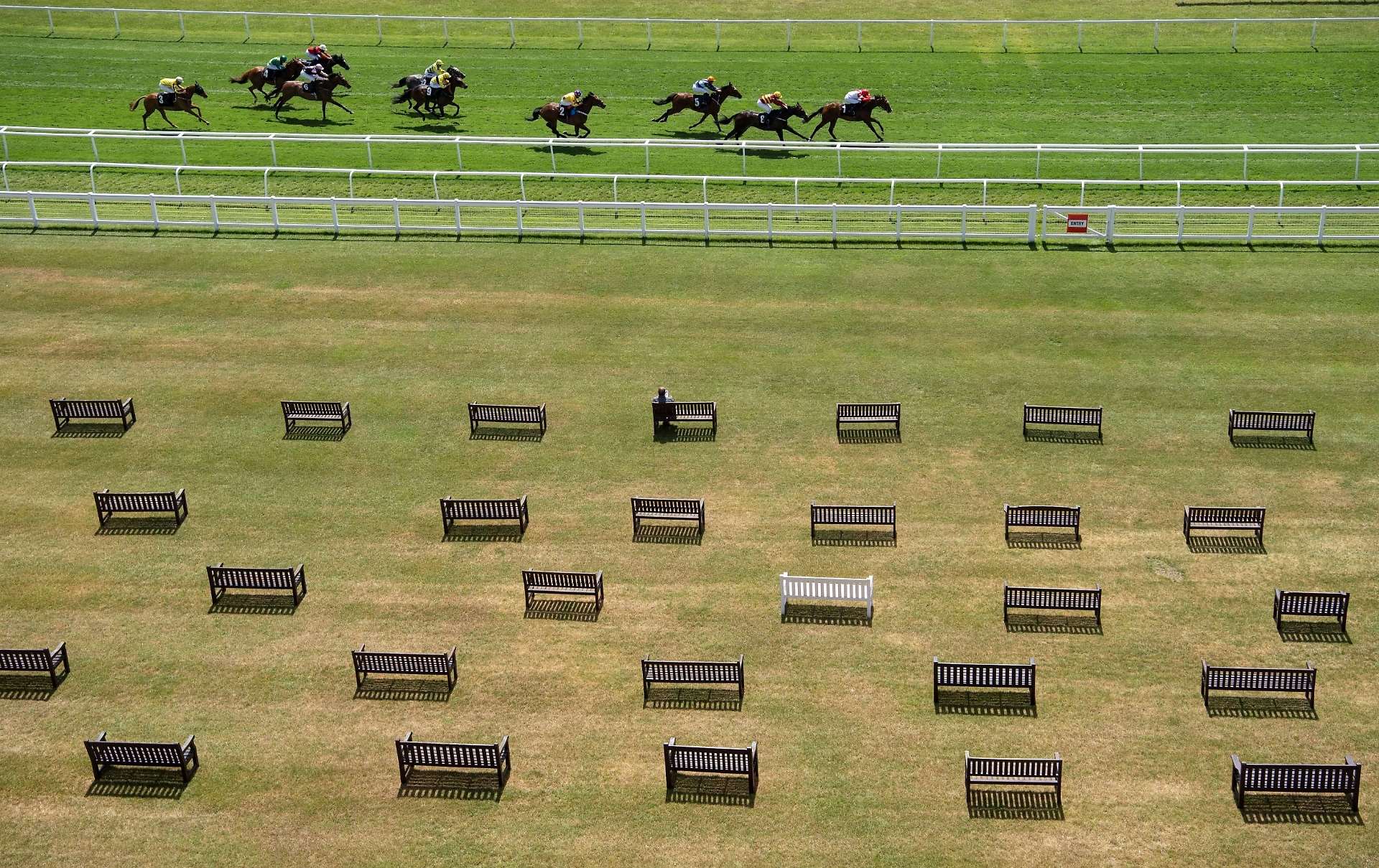 Racing behind closed doors at Newbury. Picture by Alan Crowhurst