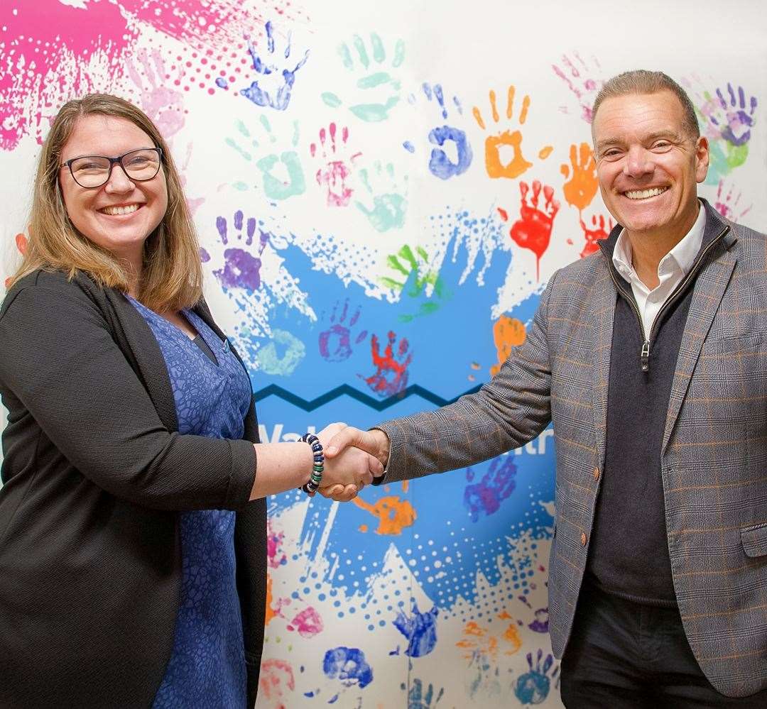 Berkshire Youth CEO Sarah Emery and Newbury Racecourse chief executive Shaun Hinds