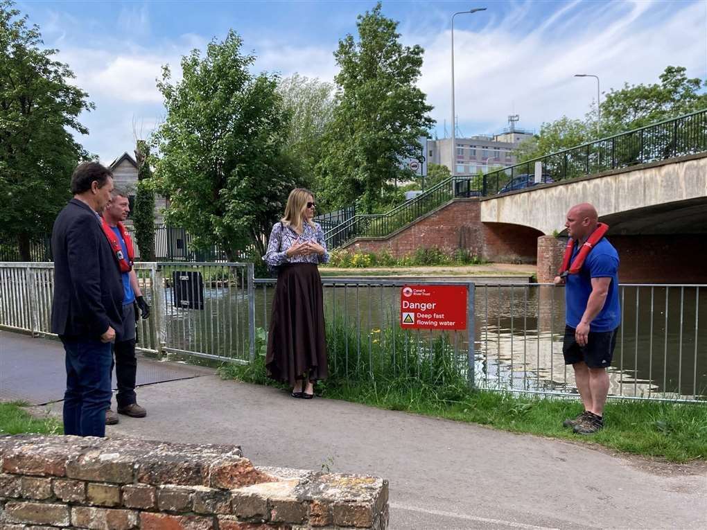 The Canal and River Trust's Mark Evans and Shaun Swain, Laura Farris MP and Dean Adlem (Canal & River Trust) inspect the new railings at Newbury on June 2
