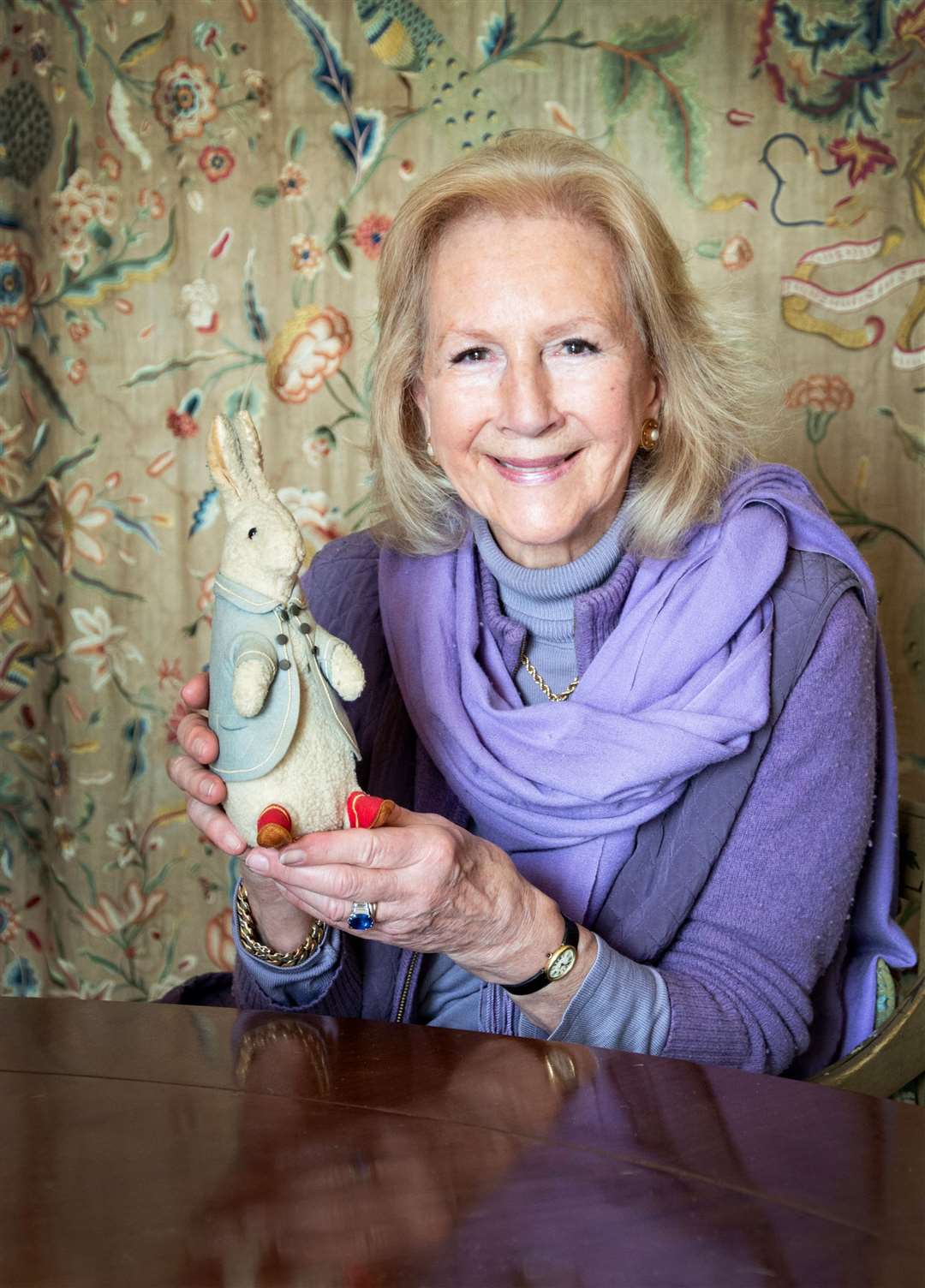 Bunny Campione with a rare 1906 Steiff wool plush Peter Rabbit that was found in a bin in Athens and given to her as a gift, sold for £7,440