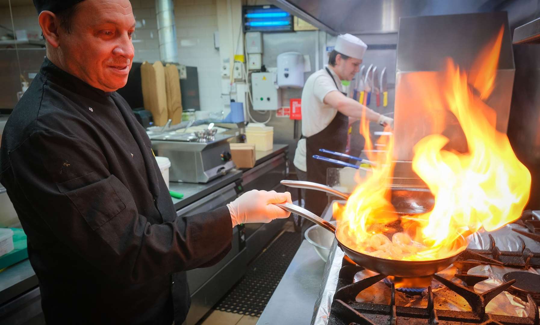 Chefs at La'De Kitchen preparing the food