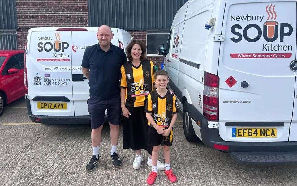 Thatcham Tornadoes U9 Tigers Coach Alex Myers with Newbury Soup Kitchen Founder Meryl Praill. Credit: Russell Lobb