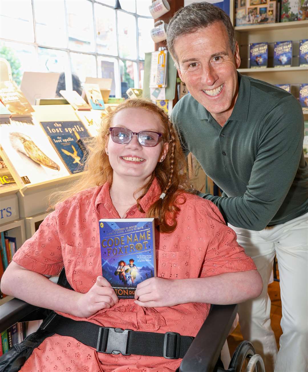 First in the queue Paige Cullum age 13 with Anton Du Beke at Hungerford Bookshop