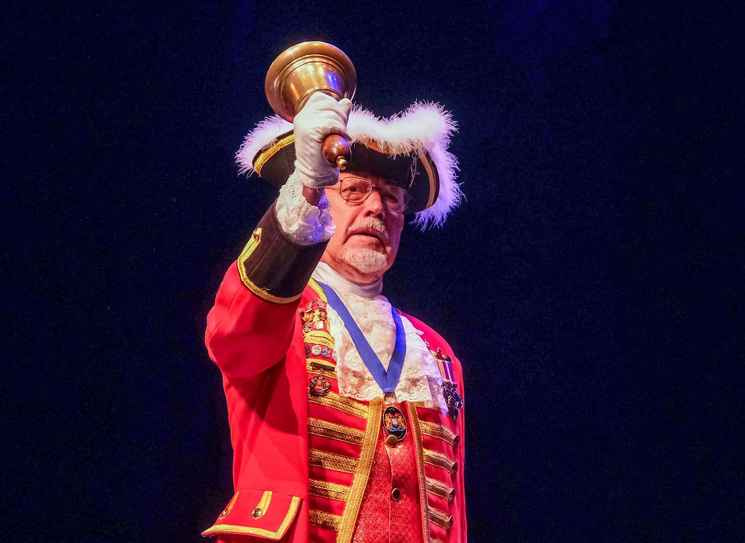 Town crier Brian Sylvester welcomes guests