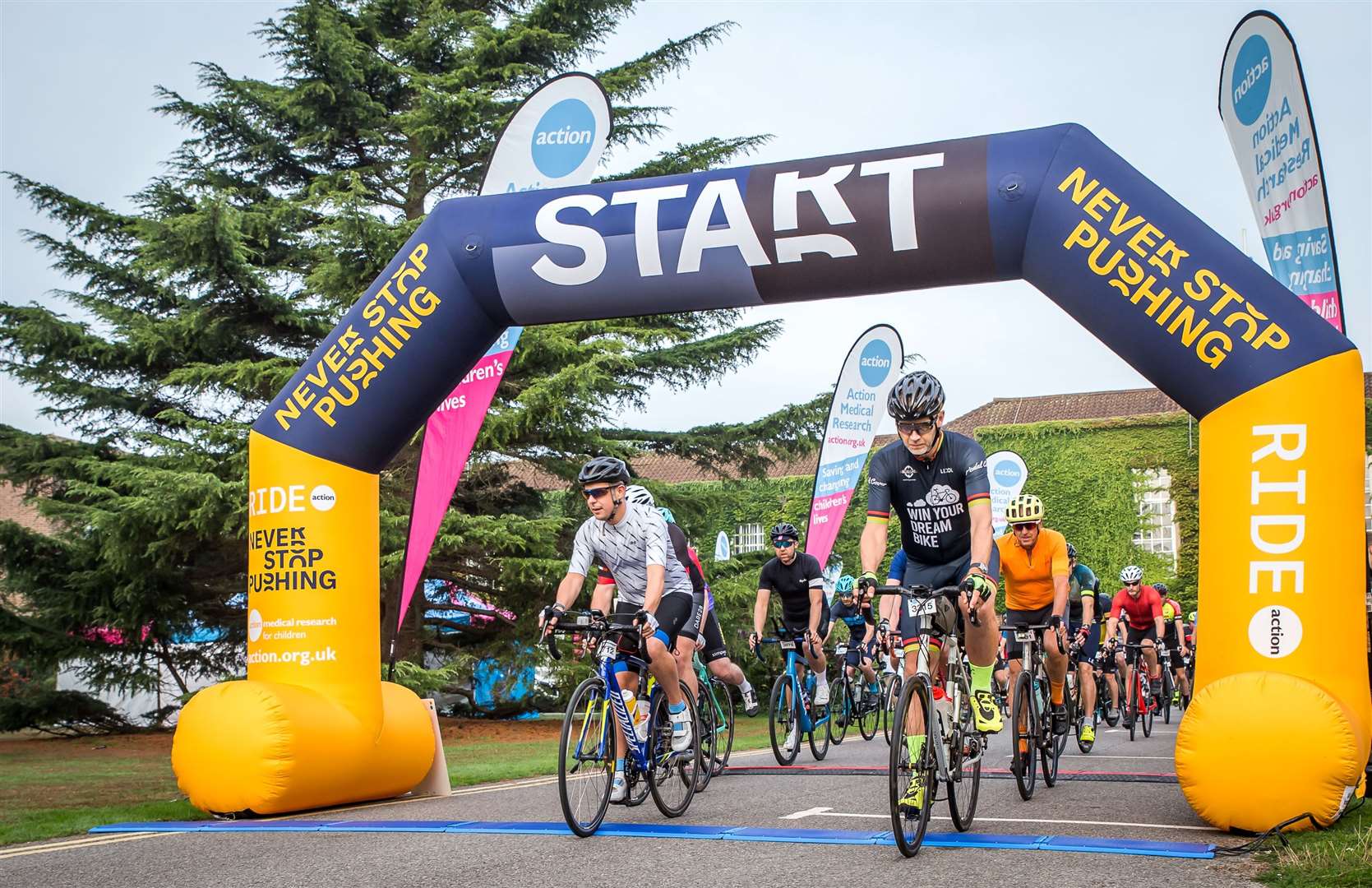 Cyclists setting off from the start line