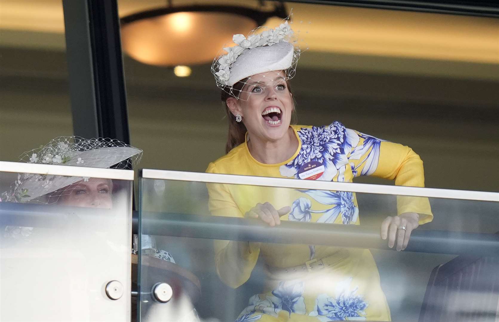 Princess Beatrice excitedly watches the King George V Stakes during Royal Ascot. Andrew Matthews/PA