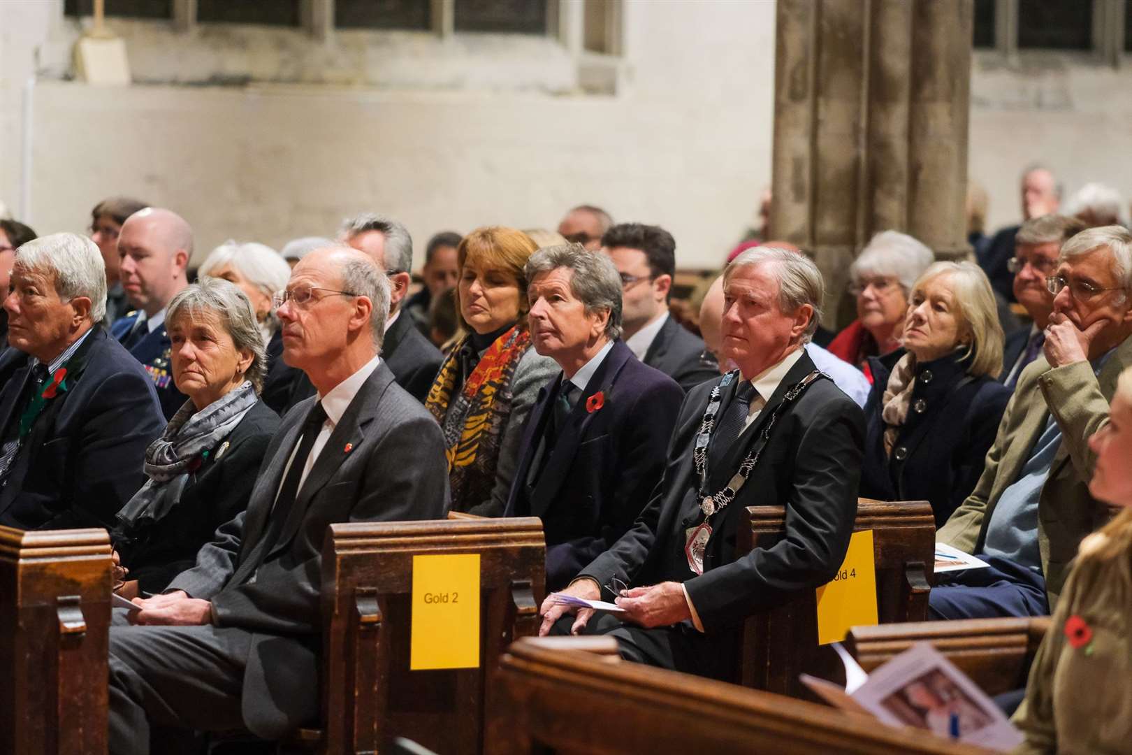 The Queen's racing manager John Warren and his wife Lady Carolyn Herbert attended the service