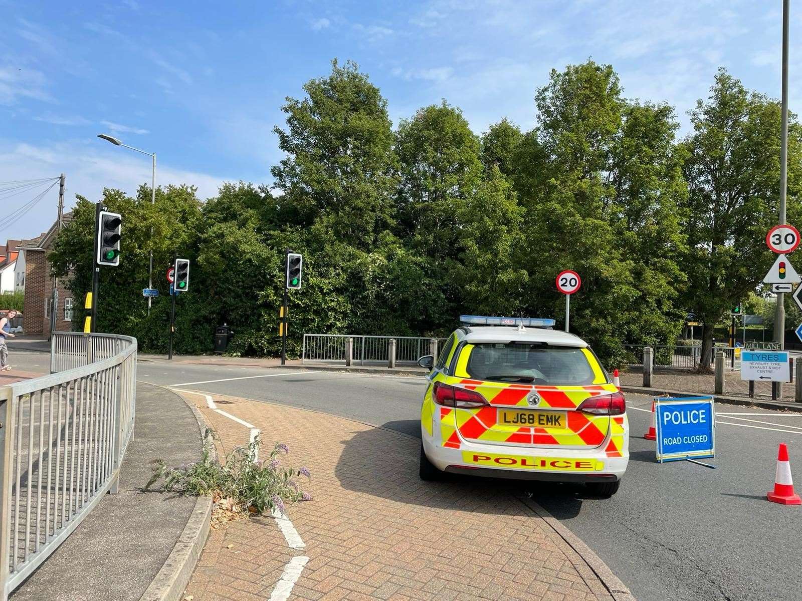 Mill Lane was closed to ensure police vehicles could get in and out of the station quickly after road closures nearby led to traffic chaos in the area