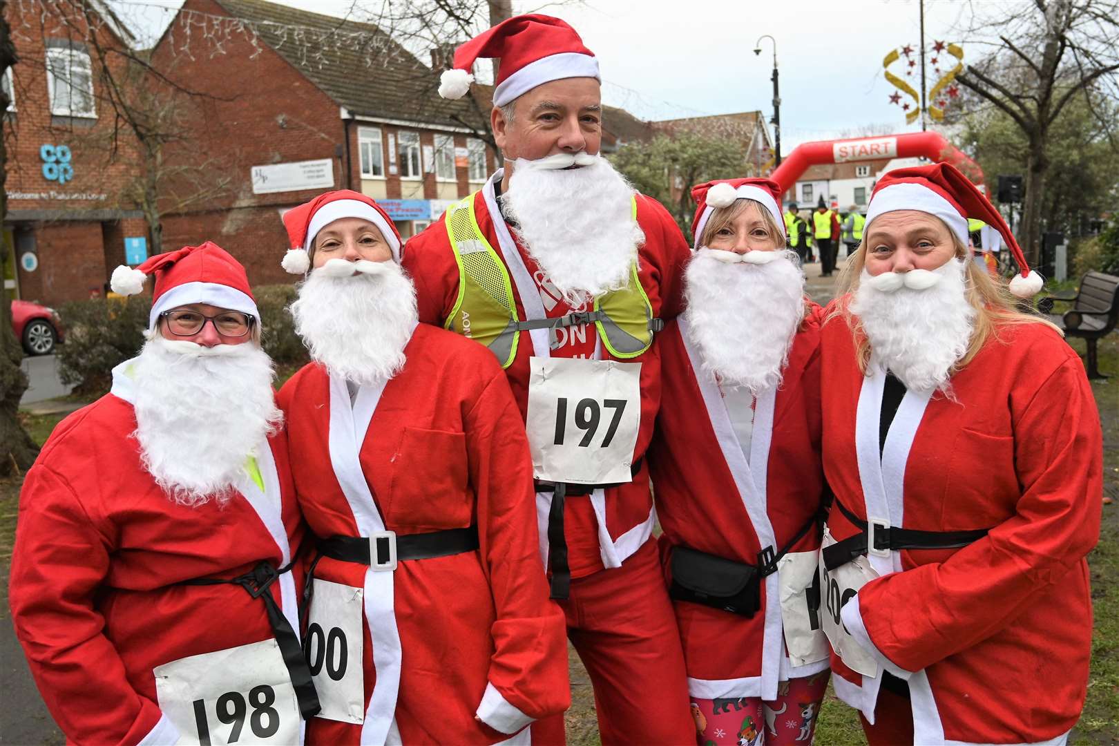 A group of very happy Santa's!