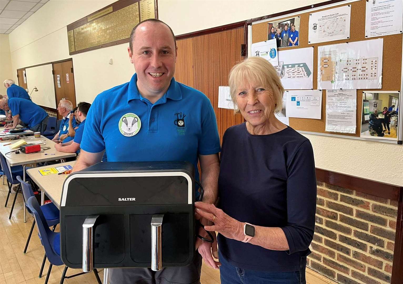 Owner of the 1,000th repaired item Carole Barrett with volunteer Kerry Morrow