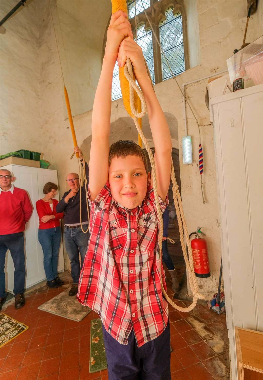 10-year-old bellringer Thomas Craig ringing on Coronation Day in Hampstead Norreys