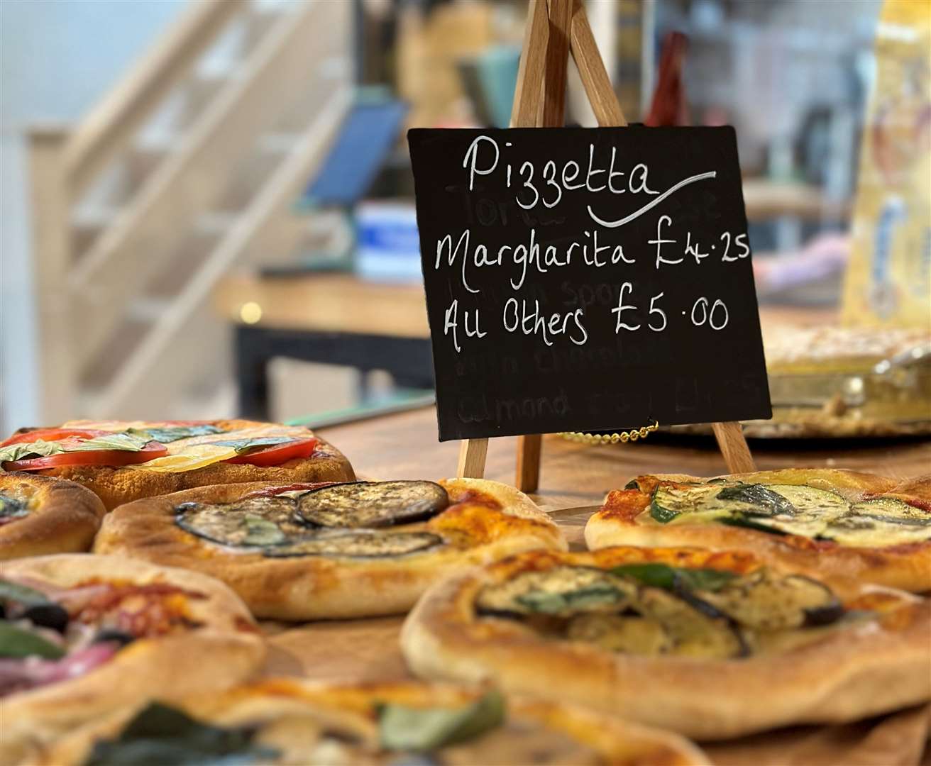 Pizzetta offerings inside Nino's deli