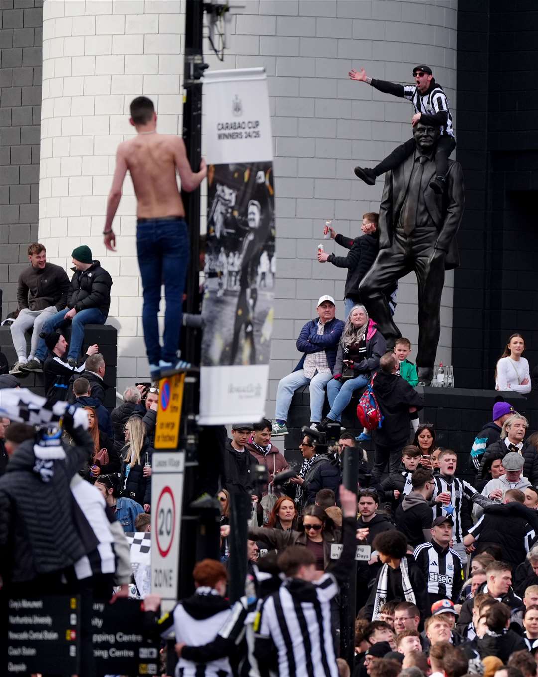 Newcastle United fans outside St James’ Park ahead of the parade (Owen Humphreys/PA)