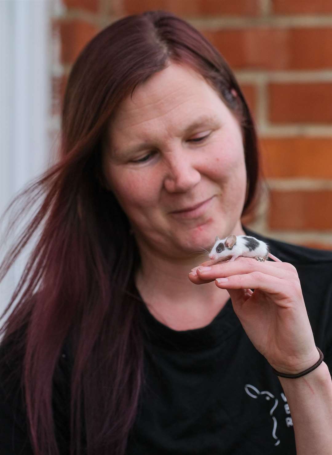 Vikki Harris with one of the rescued mice