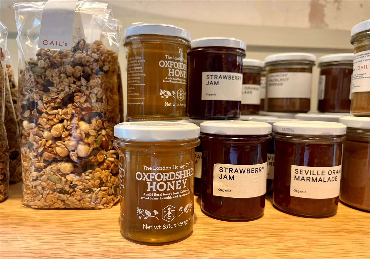 Jams, honey and other produce on sale inside the bakery
